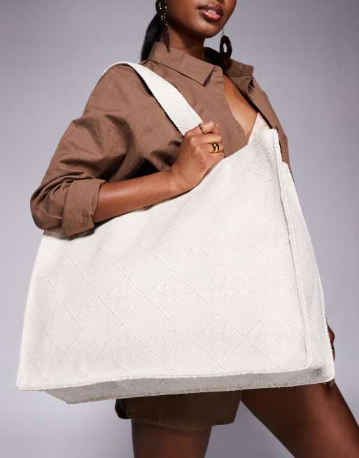 Bolso tote de hombro color crema de tejido texturizado de South Beach 