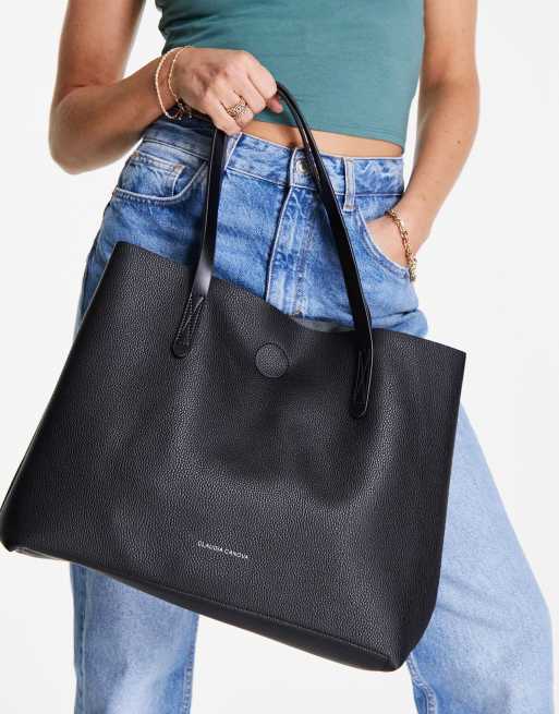 Bolso tote negro con diseño desestructurado de Claudia Canova
