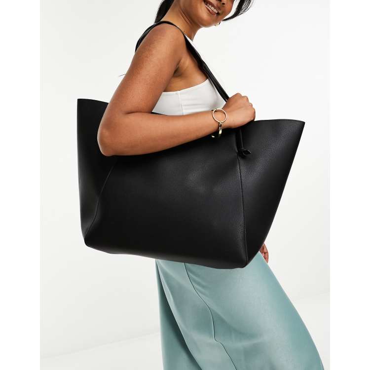 Bolso tote negro extragrande con cartera extraíble de cuero sintético de  ASOS DESIGN