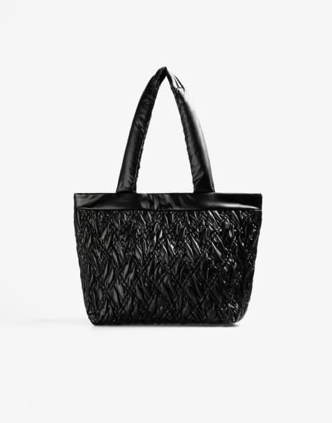 Bolso tote negro guateado con detalle de calavera de Scalpers - view 1