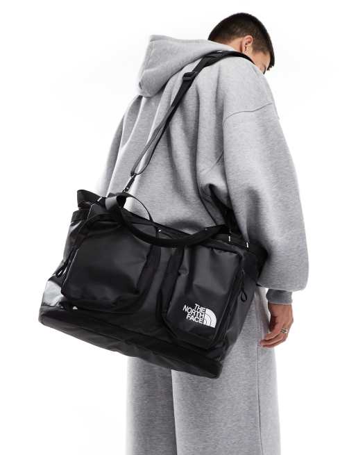 Bolso tote negro y blanco Base Camp Voyager de The North Face ASOS