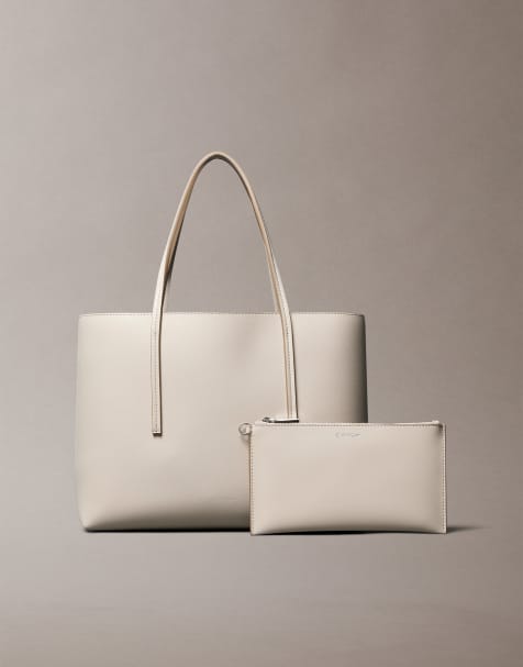Bolso tote pequeño y monedero beis con logo metalizado de Calvin Klein Jeans - view 1