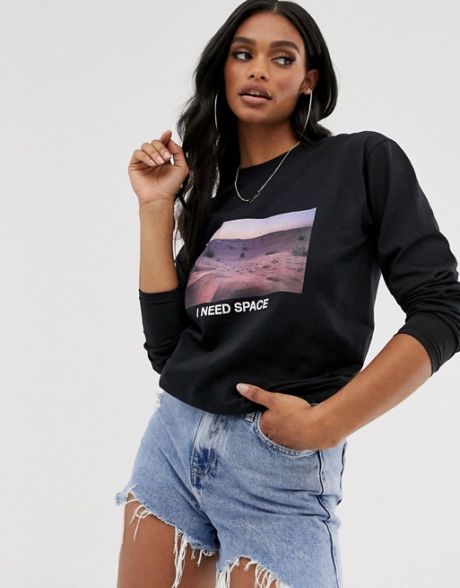 Boohoo exclusive long sleeve t-shirt with I need space slogan in black