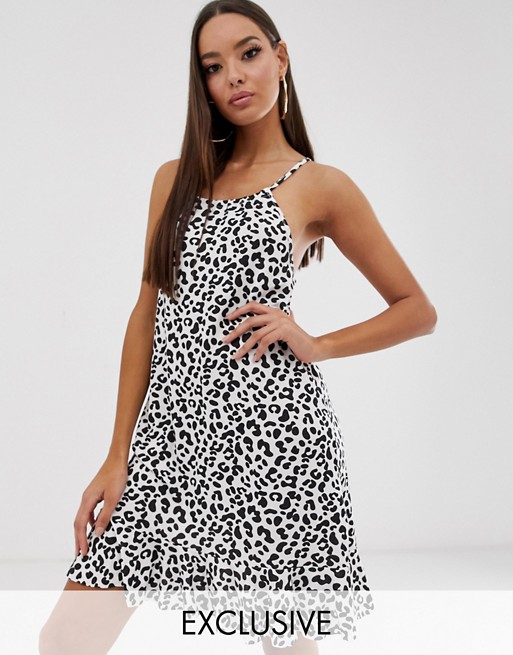 Boohoo exclusive swing dress with frill hem in white animal print
