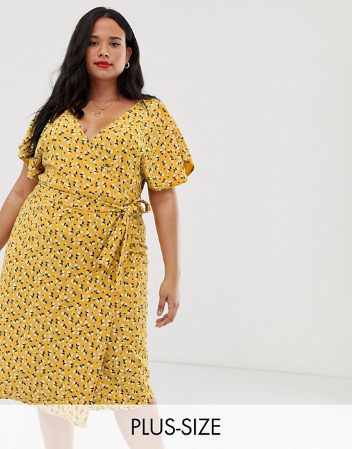 Boohoo Plus exclusive tie side midi dress in yellow floral