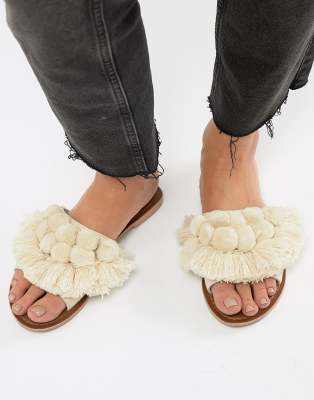 white pom pom sandals