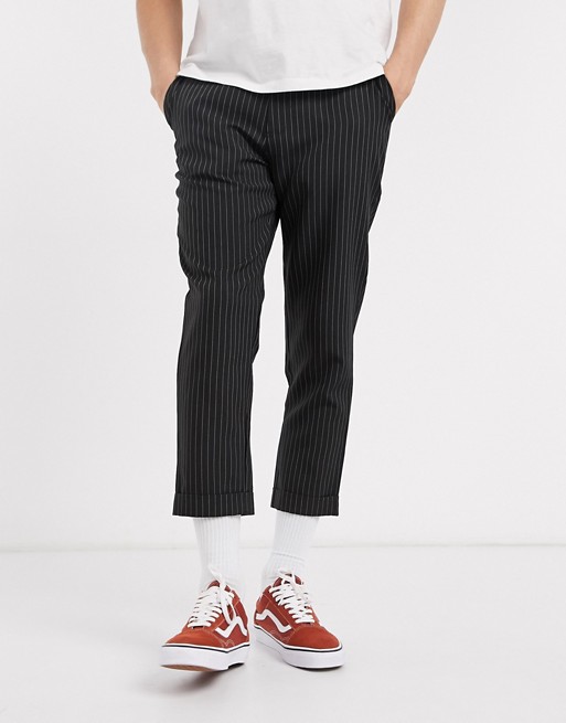 boohooMAN cropped pinstripe trousers in black