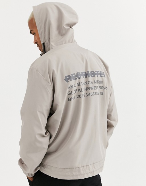 boohooMAN half zip cagoule with back print in stone