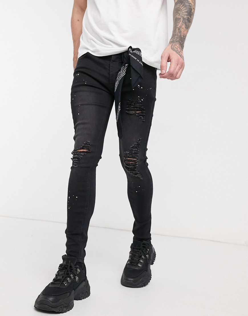 boohooMAN - Jeans skinny neri con pittura effetto spray-Nero