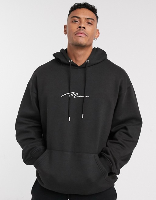 BoohooMan man signature embroidered oversized hoodie in black
