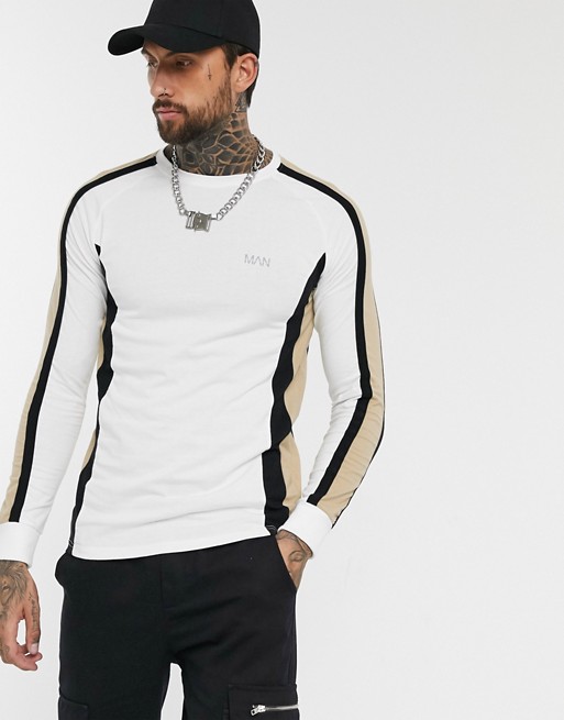 boohooMAN muscle fit long sleeve top with cut and sew panels in white