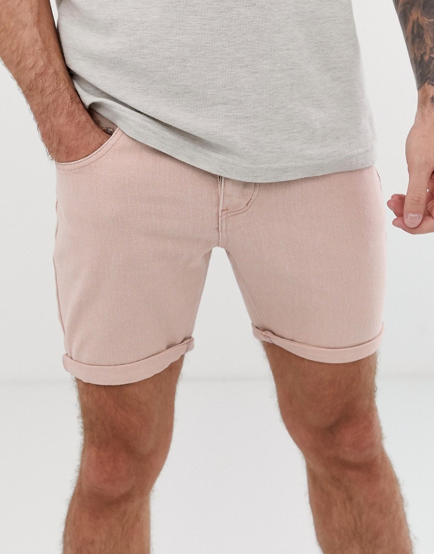 boohooMAN - Pantaloncini di jeans slim rosa polvere