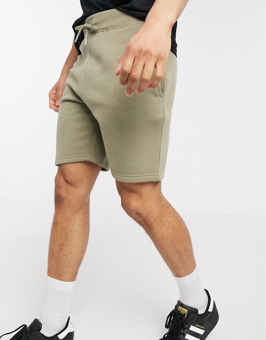 BoohooMAN - Pantaloncini lunghezza media con scritta distintiva Man-Verde