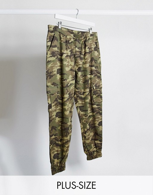 boohooMAN Plus & Tall skinny fit cargo camo woven joggers in green