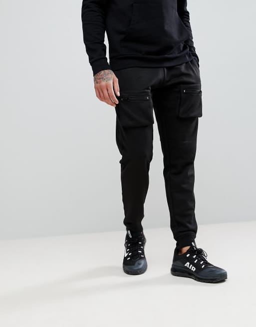 boohooMAN - Skinny joggingbroek met zakken met rits, in zwart