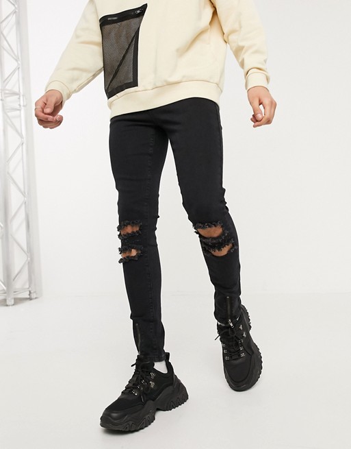 boohooMAN super skinny busted knee jeans with zips in black