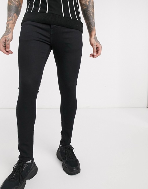 boohooMAN super skinny jeans in black