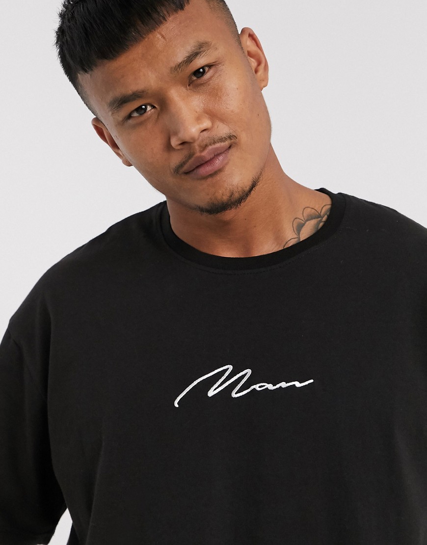 BoohooMAN - T-shirt oversize con scritta Man nera-Nero