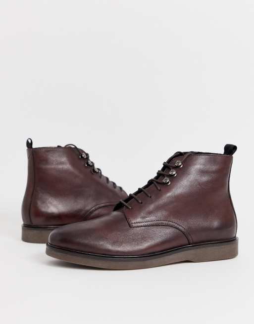 h by hudson battle lace up boots in black leather