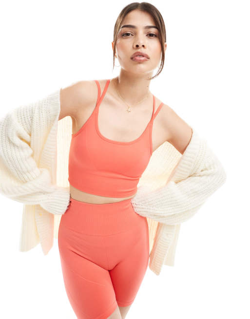 Born Living Yoga - Dana - Brassière de sport sans coutures à rembourrage amovible - Corail