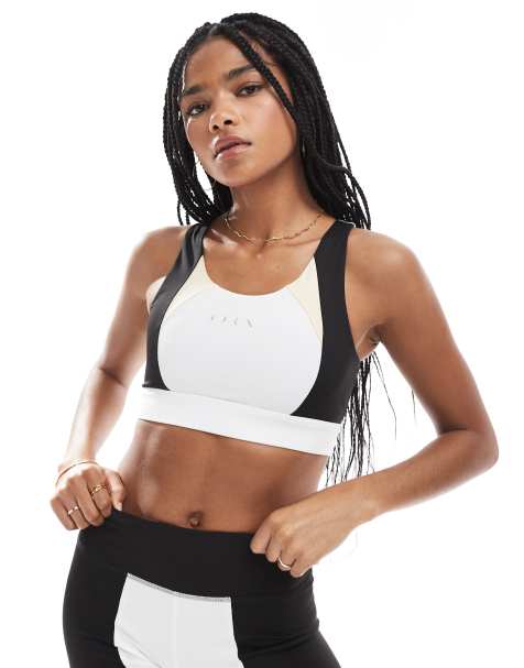 Born Living Yoga – Fiorella – Sport-BH in Schwarz/Steinbeige mit herausnehmbarer Wattierung - view 1