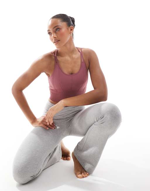 Born Living Yoga - Kamay - Reggiseno sportivo senza cuciture rosa con imbottitura rimovibile