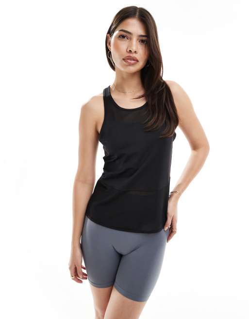 Born Living Yoga - Kiava - Mouwloos T-shirt in zwart