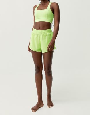 Born Living Yoga - Padma - Shorts in Limettengrün mit integrierter kurzer Hose