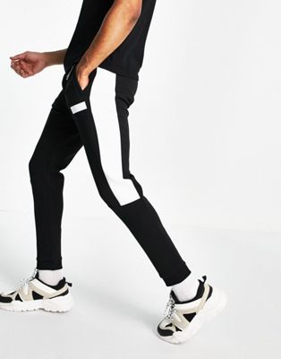 BOSS Athleisure Hadiko Batch logo joggers with contrast side panel in black