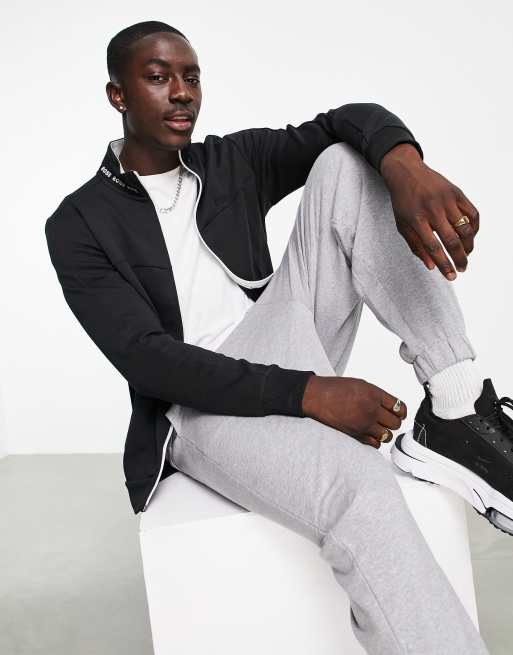 BOSS Athleisure – Skaz 1 – Czarna kurtka dresowa z ozdobną taśmą z logo i zapięciem na zamek