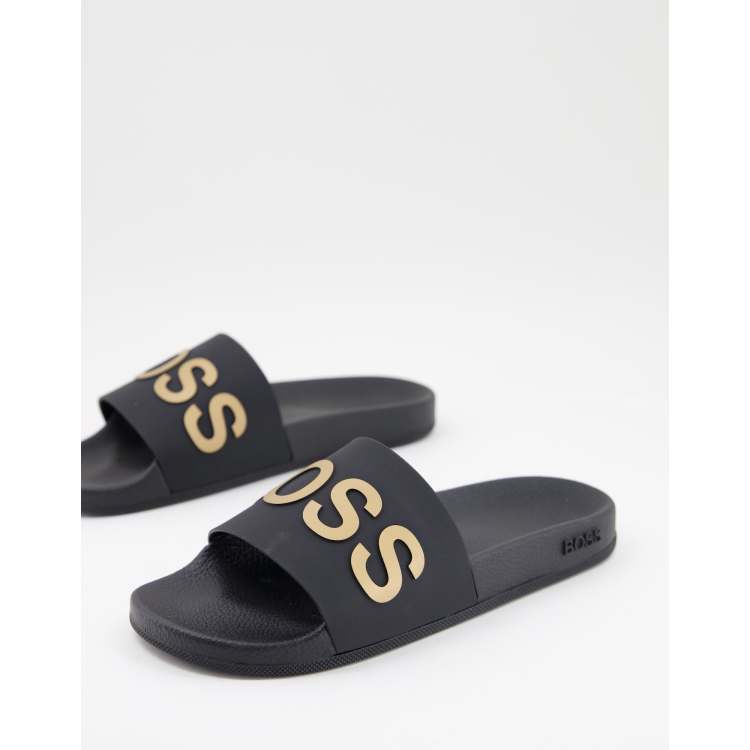 BOSS Bay sliders in black gold ASOS