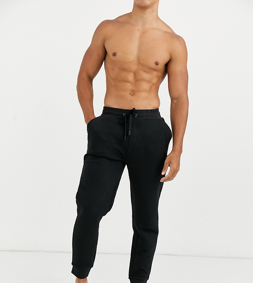 BOSS - Bodywear - Contemporary - Gewatteerde joggingbroek met logo en boorden in zwart
