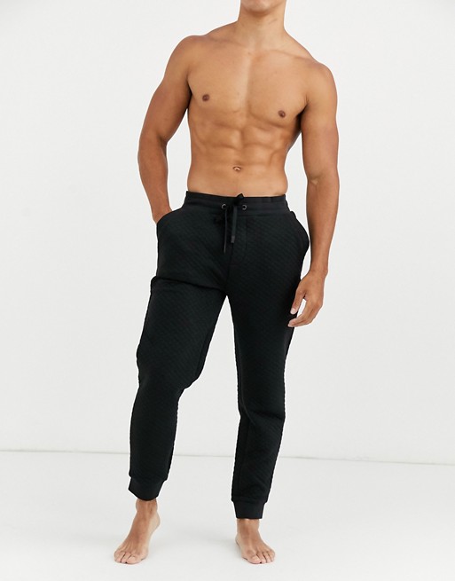 BOSS bodywear Contemporary quilted logo cuffed joggers in black