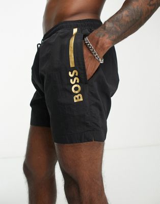 BOSS Bodywear Ole gold logo swimshorts in black - ASOS Price Checker