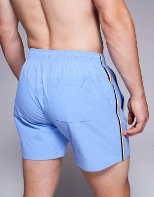 Shop Boss Bodywear Boss Iconic Side Stripe Logo Swim Shorts In Blue
