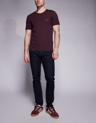 Delaware - Schmal geschnittene Jeans in dunkelblauer Waschung Blau W34