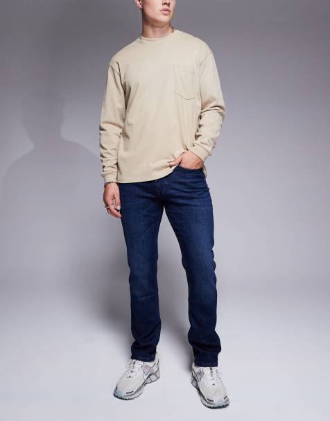BOSS Orange – Delaware – Schmal geschnittene Jeans in dunkler Waschung - view 1