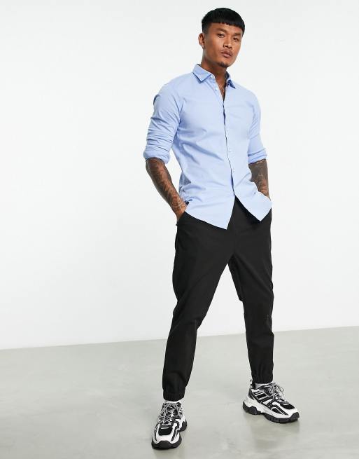 black chinos blue shirt