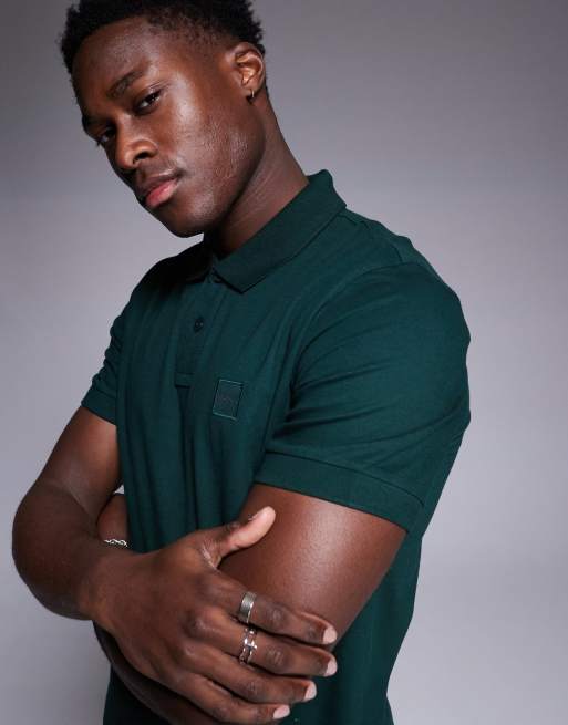 BOSS Orange - Passenger - Slim-fit piqué polo in donkergroen met logo in dezelfde tint