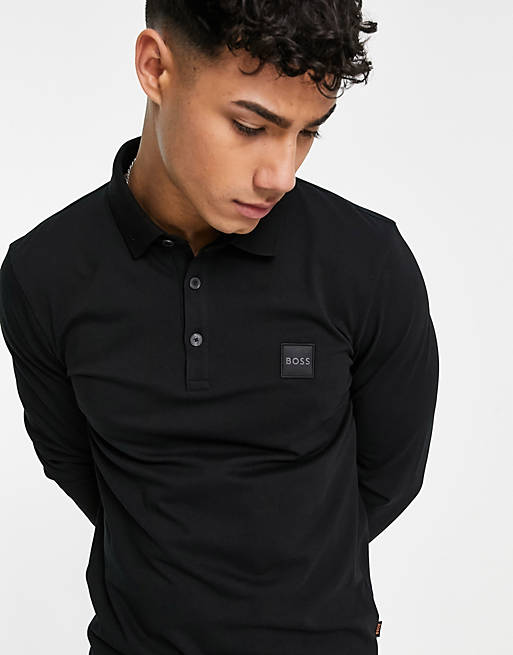 BOSS Orange Passerby long sleeve polo shirt in black | ASOS