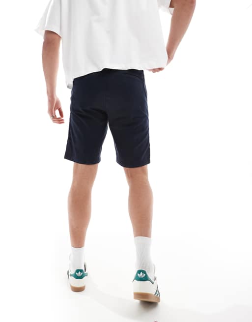 BOSS Orange – Schmal geschnittene Chino-Shorts aus Baumwolle in Marineblau, 2 von 5