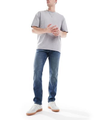 slim fit jeans in mid blue
