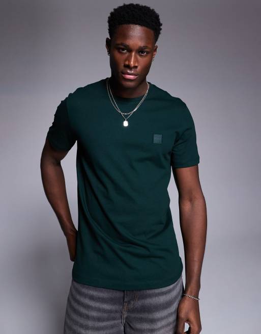 BOSS - Orange - Tales - Ruimvallend T-shirt in donkergroen met logo in dezelfde kleur