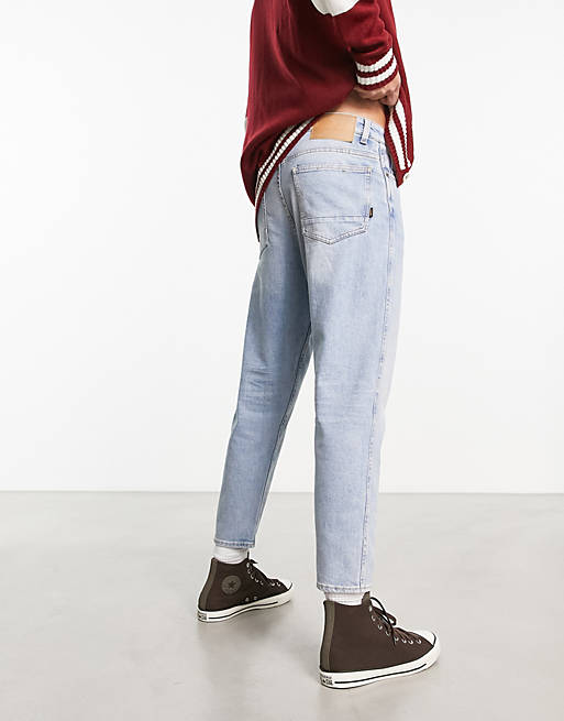 BOSS Orange Tatum BC-C tapered fit jeans in mid blue | ASOS