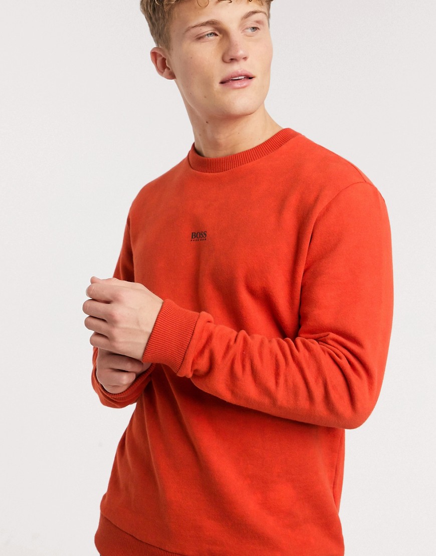 BOSS – Wash – Orange sweatshirt med rund halsringning och liten logga