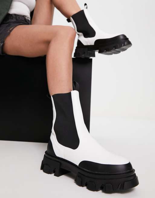 Botas blancas best sale con suela negra