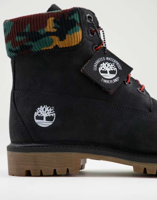 Botas de 6 pulgadas negras con estampado de camuflaje y de goma premium Timberland | ASOS