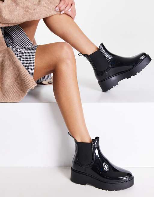 Frente dialecto Medio Botas de agua negras acharoladas Sahara de Steve Madden | ASOS