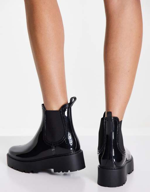 Frente dialecto Medio Botas de agua negras acharoladas Sahara de Steve Madden | ASOS