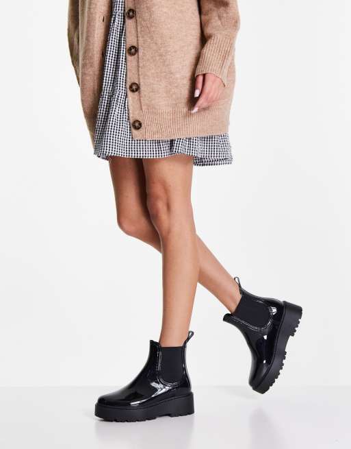 Frente dialecto Medio Botas de agua negras acharoladas Sahara de Steve Madden | ASOS